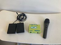 Overall lot: MIDI interface, dual sustain pedals, microphone