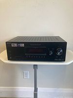 Front view of Sony STR-DG500 receiver showing display, knobs, buttons