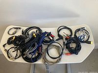 Top view of assorted cables spread on table