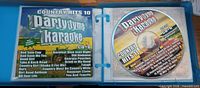 Open case showing Country Hits 10 insert and Country Hits 11 disc