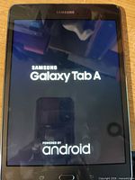 Tablet front displaying Galaxy Tab A boot screen
