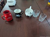 All five pieces lined up on table