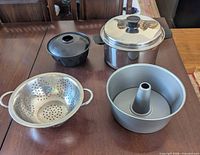 All four kitchen items grouped on table