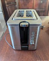 Front view of Chefman toaster showing controls and slots