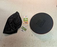 Full set laid out: balance board, manual, DVD, carrying bag