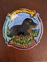 Top view showing dachshund motif and colourful bone border