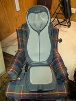 Massage cushion positioned on chair showing overall appearance