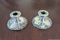 Two Viking silver-plated grapevine candlestick holders top view