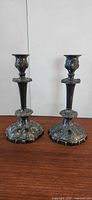 Full view of both matching Meriden candlesticks