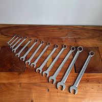 Full view of all 13 Gray combination wrenches arranged by size
