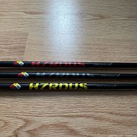 Three HZRDUS shafts side-by-side showing graphics