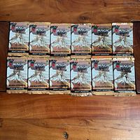 Front view of 12 sealed Dominaria Remastered booster packs