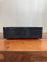 Front view of NAD C 270 amplifier showing power button and model marking