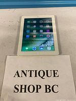 Front view powered on displaying iOS home screen