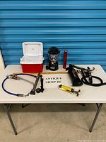 Overall lot on table showing all items