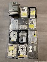 Overall view of the fifteen IDE/PATA hard drives, including three in metal caddies
