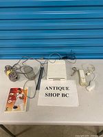 Console, cables, controller, games overview