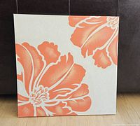 Front view of square hibiscus print showing colors and design