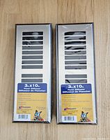 Front view of both sealed vent covers with labels visible