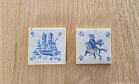 Front view of both Delft miniature tiles