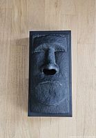 Top view showing Moai face and tissue slot