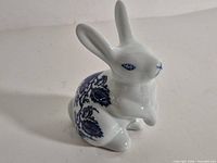 Full view of ceramic rabbit figurine left side