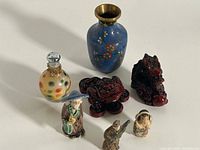 Group shot of all seven items showing relative size and materials