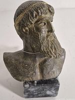 Full view of bronze bust on marble base