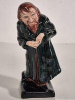 Full view of Fagin figurine on base