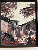 Full view of framed oil on canvas painting showing buildings and trees