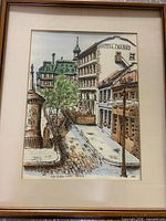 Full view of framed watercolor with mat and wooden frame