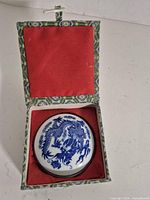 Seal paste box inside red-lined presentation box