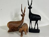 All three wooden animal figures together