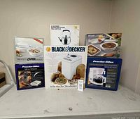 All five boxed items displayed together