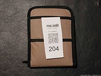 Closed beige pouch front view