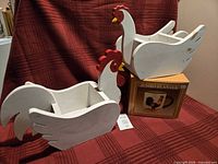 Two wooden chicken planters and boxed jumbo planter