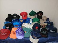 Front view showing all baseball caps arranged by color and logo