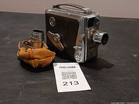 Camera front and separate lens in pouch