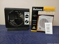 Heater front view alongside retail box and lot tag