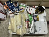 Overview of foam tape, zip ties, respirator mask, metal strapping