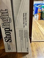 Box showing vertical Shoplight branding