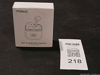 Front of sealed POMUIC W23 earbuds retail box