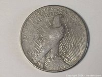 Full view of reverse side of 1922 Peace Dollar coin.