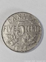 Reverse with CANADA FIVE CENTS 5 1943 and maple leaves