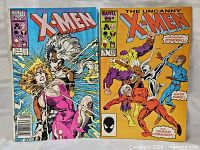 Front covers of both comics showing titles and artwork