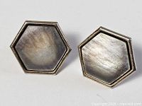 Front view of both hexagonal abalone sterling silver earrings