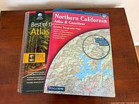 Front covers of both atlas books