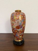 Front view showing full baluster profile, floral pattern and gilding