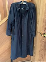 Front view of full-length London Fog coat on hanger