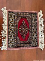 Front view showing full design, fringe, colours